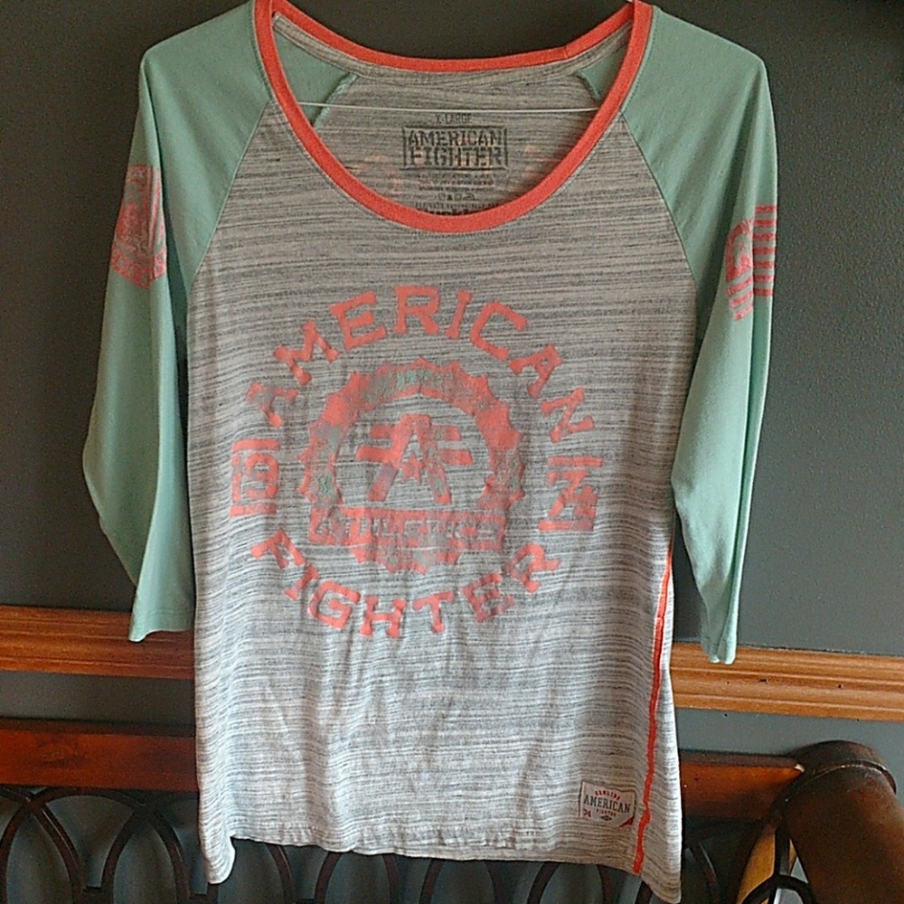 Peach, grey, and mint green American Fighter 3/4.